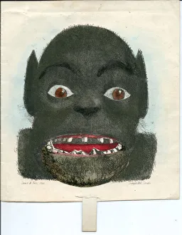 Monster's face with tab pull on a greetings card Monster's face with tab pull on a greetings card