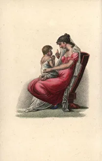 Mother with child praying on her lap Mother with child praying on her lap