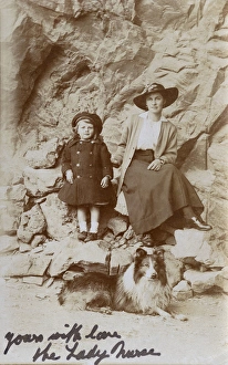 Mother and daughter with a Border Collie Mother and daughter with a Border Collie