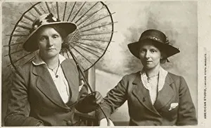 Similarity Gallery: A Mother and daughter have a duo portrait photograph taken at the American Studio