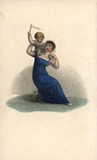 Mother playing the flying angel game with a baby Mother playing the flying angel game with a baby
