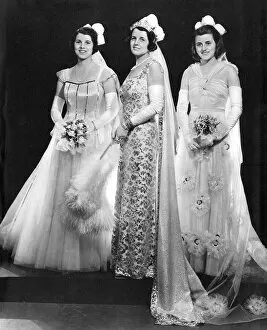 Mrs Kennedy and her deb daughters