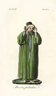 Muezzin performing the call to prayer or adhan Muezzin performing the call to prayer or adhan