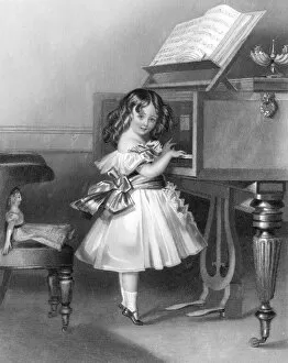 Music at home - little girl at the piano