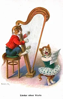 Two musical cats on a German greetings postcard Two musical cats on a German greetings postcard