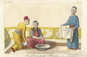 A Muslim man performing his ablutions before prayer A Muslim man performing his ablutions before prayer