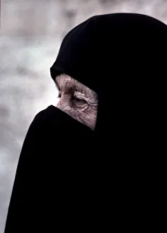 Muslim woman in black burka or niqab - Istanbul, Turkey Muslim woman in black burka or niqab - Istanbul, Turkey