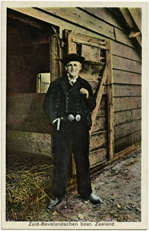 The Netherlands - Dutch Farmer outside his barn The Netherlands - Dutch Farmer outside his barn