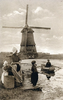 The Netherlands - Volendam - Ferry Service & Windmill The Netherlands - Volendam - Ferry Service & Windmill