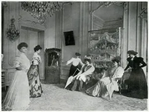 Prints of Morning inspection at Paquins where the French models are wearing fashionable dresses for London showrooms. Date: 1905 Fashion Prints: Fashion House Paris Dresses 1905 Print