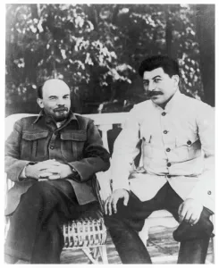 New Images August 2021 Prints: Lenin and Stalin Sitting on a Bench Print, circa 1920