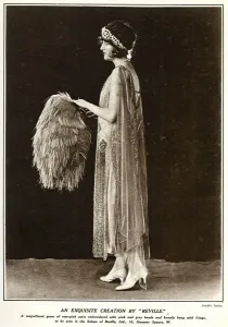 Prints of Photograph of a rose-pink satin gown with pink and grey beads by Reville, Hanover Square. Date: 1921 Fashion Prints: 1921 Reville Rose-Pink Satin Gown Print