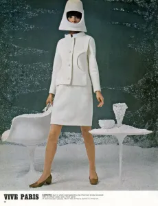 Prints of Viva Paris. Pierre Cardins suit in white wool gabardine (by Fournier) single-breasted with an officer collar and a front panel of semi-circular cutouts Fashion Prints: Viva Paris Print: Pierre Cardin's 1966 White Wool Suit