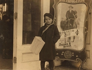 Newsie, ten years old. Going into a moving picture theatre w Newsie, ten years old. Going into a moving picture theatre w