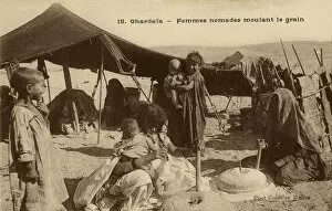 Ghardaia Collection: Nomadic women mince the grain, Ghardaia