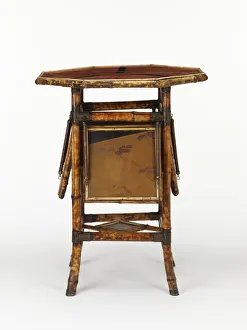 <b class=qtipBold><figcaption>Occasional table</figcaption></b><br>Bamboo occasional table with a lacquered octagonal top and four drop-down leaves, manufactured by W.F. Needham in Birmingham, c.1888. Date: c.1888<br><em>© The Geffrye Museum of the Home / Mary Evans Picture Library</em> Occasional table