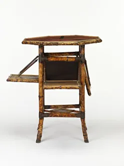 <b class=qtipBold><figcaption>Occasional table</figcaption></b><br>Bamboo occasional table with a lacquered octagonal top and four drop-down leaves, manufactured by W.F. Needham in Birmingham, c.1888. Date: c.1888<br><em>© The Geffrye Museum of the Home / Mary Evans Picture Library</em> Occasional table