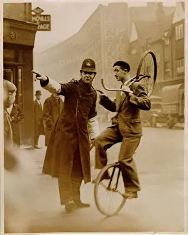 Mills Collection: Officer and Unicyclist
