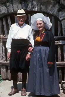 Old couple dressed in traditional costume near Dubrovnik Old couple dressed in traditional costume near Dubrovnik