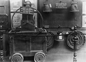 London Fire Brigade Museum Gallery: Old fire engine and other equipment in a museum