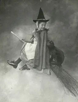 Black and White Print of Young Witch on Broomstick