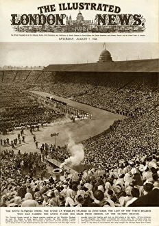 Olympics opens, last of the touch bearers lights the beacon Olympics opens, last of the touch bearers lights the beacon