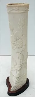 Images Dated 22nd July 2007: Pair of carved bone ornaments with raised foliate decoration