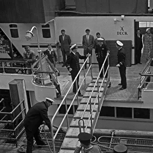 Gangplank Gallery: Passengers prepare to disembark cross-channel ferry