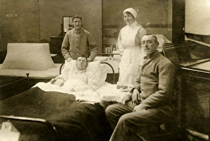 Three Patients (one in bed) with nurses Three Patients (one in bed) with nurses