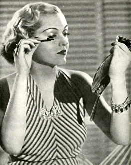 Patricia Ellis, Warner Bros star applying Max Factor make up Patricia Ellis, Warner Bros star applying Max Factor make up