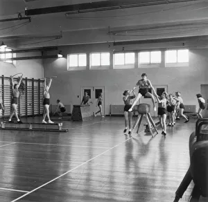 <b class=qtipBold><figcaption>Pe Class/Melton Mobray</figcaption></b><br>Physical Exercise - Fitness class in progress at Sarson School for Girls, Melton Mowbray<br><em>© Mary Evans Picture Library/HENRY GRANT</em> Pe Class/Melton Mobray