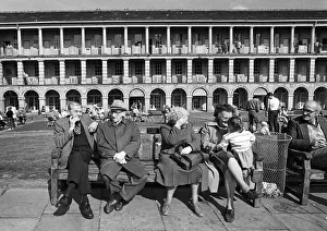 Pensioners and a child in the Piece Hall, Halifax, Yorkshire Pensioners and a child in the Piece Hall, Halifax, Yorkshire