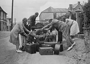 Hamper Gallery: People loading a car at Perranporth, Cornwall