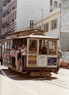 People standing in the cable cart in San Francisco USA People standing in the cable cart in San Francisco USA