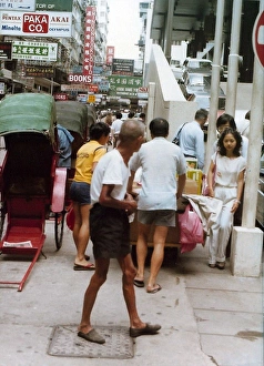 People walking in different directions on crowded street, Ho People walking in different directions on crowded street, Ho