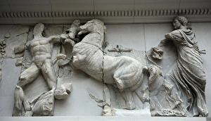 Pergamon Altar. Horse of Helios carriage attacking a giant Pergamon Altar. Horse of Helios carriage attacking a giant
