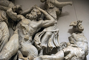 Pergamon Altar. The three Moirai, goddesses of fate, kill th Pergamon Altar. The three Moirai, goddesses of fate, kill th