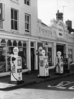 Stamps Gallery: Petrol pumps on the pavement at a service station at Ellesmere, Shropshire, England