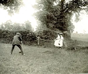 Photographing two women on countryside fence Photographing two women on countryside fence