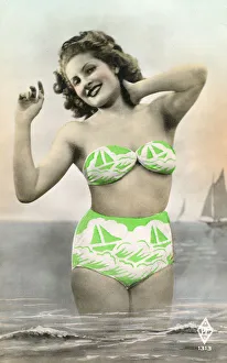 Pin-up girl on postcard in lime green nautical bikini Pin-up girl on postcard in lime green nautical bikini