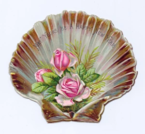 Pink roses on a shell-shaped New Year card Pink roses on a shell-shaped New Year card