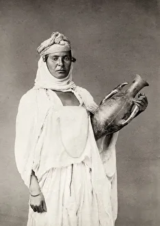 Portrait of a North African woman with a pot Portrait of a North African woman with a pot