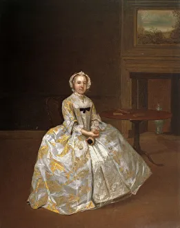 <b class=qtipBold><figcaption>Portrait of a woman in an interior</figcaption></b><br>Portrait of a woman seated in a domestic interior, oil on canvas, by Arthur Devis, c.1742, in a gilded neo-classical style frame with carved and moulded decoration. Date: c.1742<br><em>© The Geffrye Museum of the Home / Mary Evans Picture Library</em> Portrait of a woman in an interior