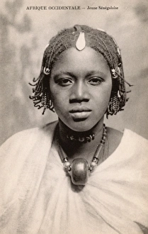 Pretty Young Senegalese girl with braided hair and necklace Pretty Young Senegalese girl with braided hair and necklace