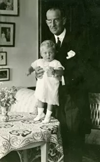 Prince Andrew of Greece with his eldest child, Margarita