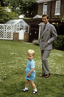 Prince Charles and William in a garden Prince Charles and William in a garden