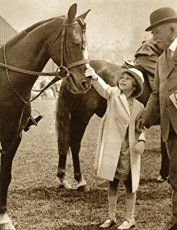 Princess Elizabeth meets a pony at the Richmond Horse Show Princess Elizabeth meets a pony at the Richmond Horse Show