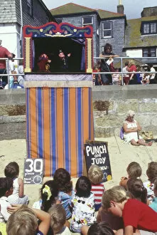 Holidaymakers Gallery: Punch and Judy show on the beach, Cornwall