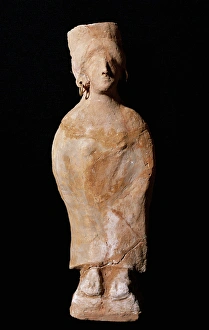 Punic Art. Figurine of a goddess with slopes. Terracota. Fro Punic Art. Figurine of a goddess with slopes. Terracota. Fro