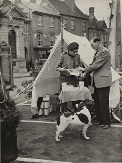 Queens Scout selling Coronation programme Queens Scout selling Coronation programme